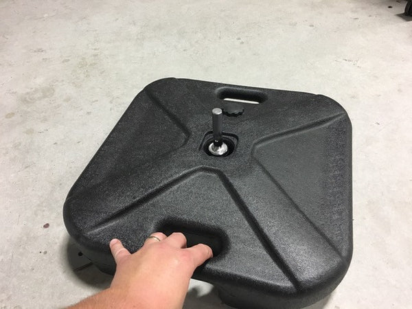 Water ballast on flag ground stand